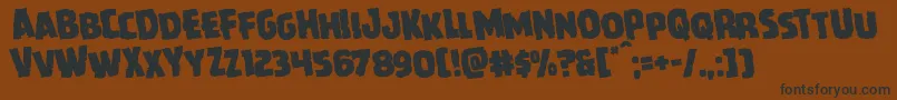 Howlinmadrotate Font – Black Fonts on Brown Background