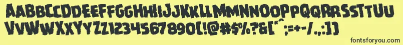 Howlinmadrotate-Schriftart – Schwarze Schriften auf gelbem Hintergrund