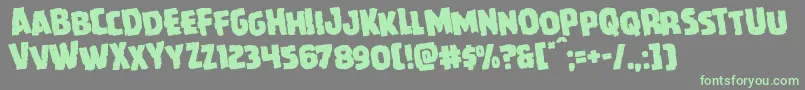 Howlinmadrotate-Schriftart – Grüne Schriften auf grauem Hintergrund