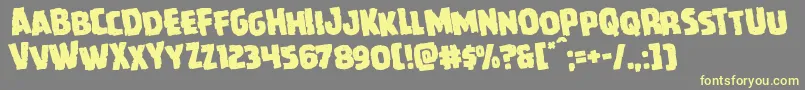 Czcionka Howlinmadrotate – żółte czcionki na szarym tle