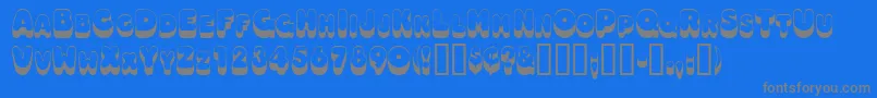 フォントOodlesscapsssk – 青い背景に灰色の文字