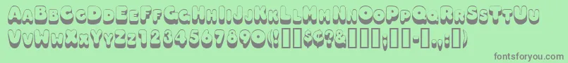 Oodlesscapsssk Font – Gray Fonts on Green Background