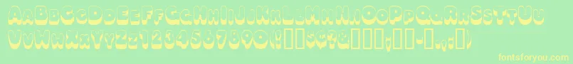 Oodlesscapsssk Font – Yellow Fonts on Green Background