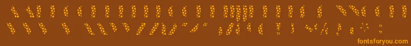 フォントManbowDots – オレンジ色の文字が茶色の背景にあります。