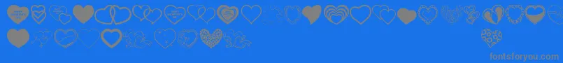 VanlentinesDayTfb-Schriftart – Graue Schriften auf blauem Hintergrund