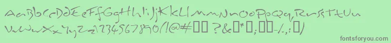 Inkburro Font – Gray Fonts on Green Background