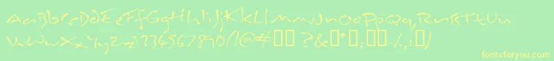 フォントInkburro – 黄色の文字が緑の背景にあります