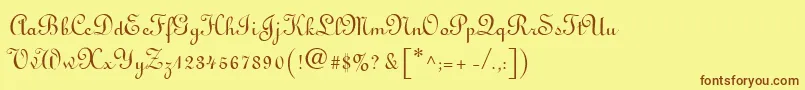 フォントLinoscript – 茶色の文字が黄色の背景にあります。