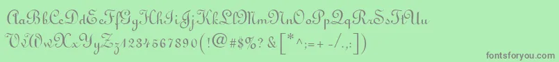 フォントLinoscript – 緑の背景に灰色の文字