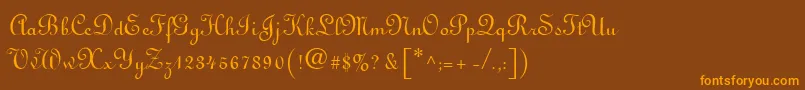 フォントLinoscript – オレンジ色の文字が茶色の背景にあります。