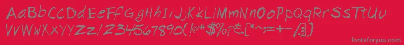 Napkinscriptssk-Schriftart – Graue Schriften auf rotem Hintergrund