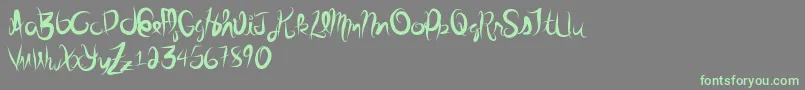 Stolenscript Font – Green Fonts on Gray Background