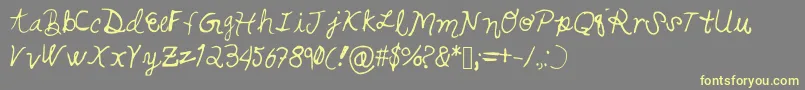 Swirlsandcurls Font – Yellow Fonts on Gray Background