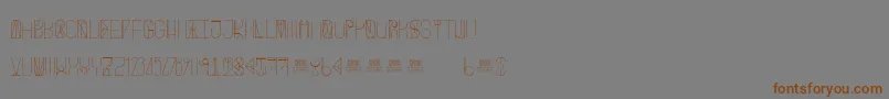 FreakShowLight-fontti – ruskeat fontit harmaalla taustalla