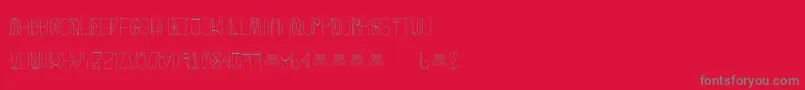 Fonte FreakShowLight – fontes cinzas em um fundo vermelho
