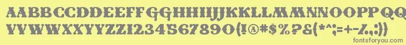 フォントConei – 黄色の背景に灰色の文字