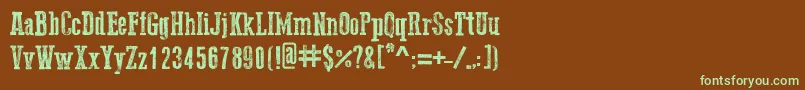 フォントGo2OldWestern – 緑色の文字が茶色の背景にあります。