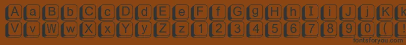 フォントFikey1 – 黒い文字が茶色の背景にあります