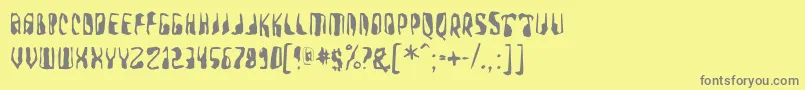 フォントFarmerswrite – 黄色の背景に灰色の文字