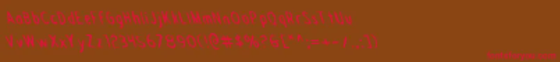 Draftingboardl-Schriftart – Rote Schriften auf braunem Hintergrund
