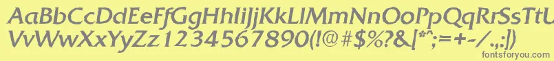 フォントQuadratantiqueItalic – 黄色の背景に灰色の文字