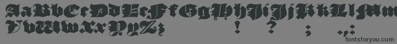 JmhMorenetaDivine-Schriftart – Schwarze Schriften auf grauem Hintergrund