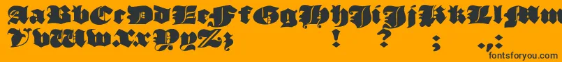 JmhMorenetaDivine Font – Black Fonts on Orange Background