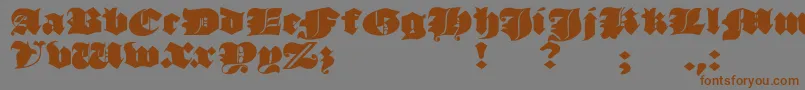JmhMorenetaDivine Font – Brown Fonts on Gray Background