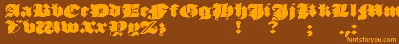 JmhMorenetaDivine Font – Orange Fonts on Brown Background