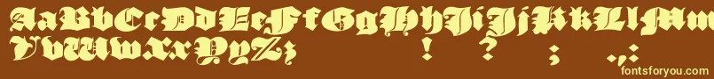JmhMorenetaDivine Font – Yellow Fonts on Brown Background