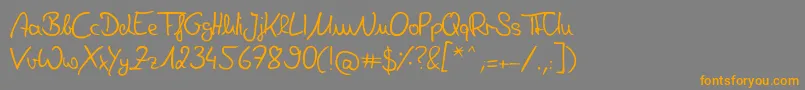 Czcionka DeniseHandwriting – pomarańczowe czcionki na szarym tle