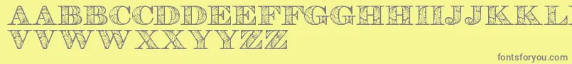 Retrographdemo-Schriftart – Graue Schriften auf gelbem Hintergrund