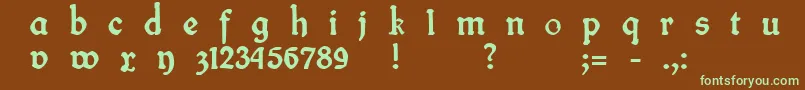 フォントFinFraktur – 緑色の文字が茶色の背景にあります。