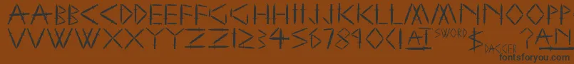 YySwordAndDagger-Schriftart – Schwarze Schriften auf braunem Hintergrund