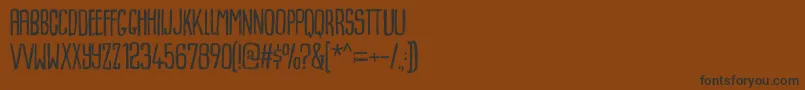Dummkopfdemo Font – Black Fonts on Brown Background