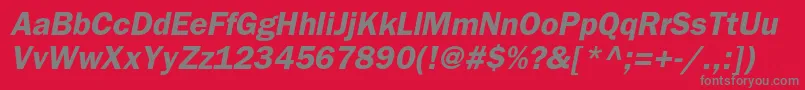 BloknotcBolditalic-fontti – harmaat kirjasimet punaisella taustalla
