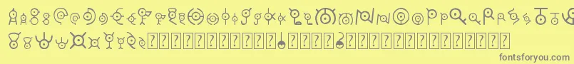 Unown-fontti – harmaat kirjasimet keltaisella taustalla