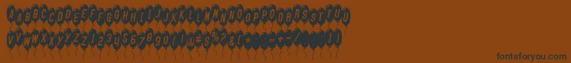 SfBalloonsThinItalic-Schriftart – Schwarze Schriften auf braunem Hintergrund