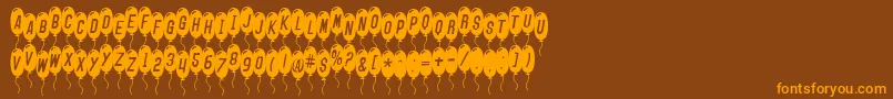 Police SfBalloonsThinItalic – polices orange sur fond brun