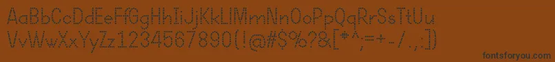 DotcirfulRegular Font – Black Fonts on Brown Background