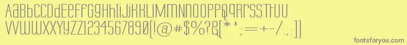 フォントLabtopUnicaseWide – 黄色の背景に灰色の文字