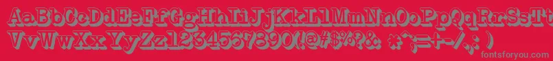NeobulletinExtruded-fontti – harmaat kirjasimet punaisella taustalla