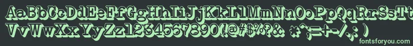 フォントNeobulletinExtruded – 黒い背景に緑の文字