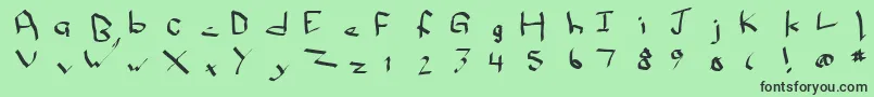 Qwikn-Schriftart – Schwarze Schriften auf grünem Hintergrund