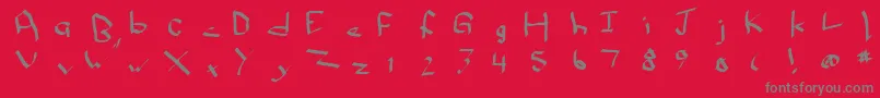 フォントQwikn – 赤い背景に灰色の文字