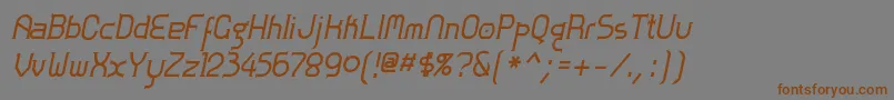 フォントZolofb – 茶色の文字が灰色の背景にあります。