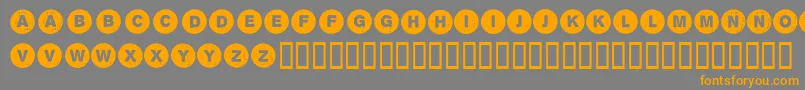 フォントSectii00 – オレンジの文字は灰色の背景にあります。