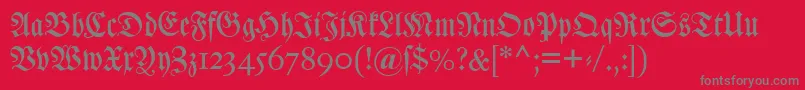 Fonte Dslutherschetitel – fontes cinzas em um fundo vermelho