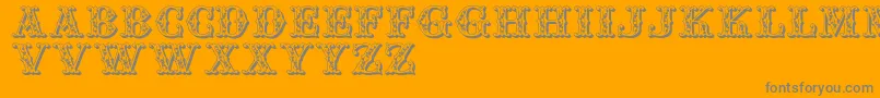 Jfaufair-Schriftart – Graue Schriften auf orangefarbenem Hintergrund