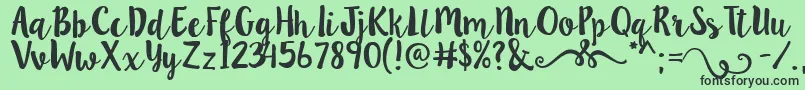 フォントLillybelle – 緑の背景に黒い文字